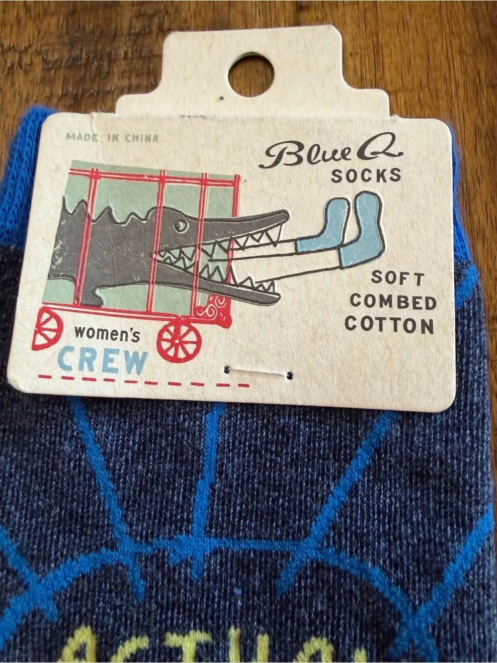 Blue Q Navy Crew Socks with Yellow 'Actual Super Hero' Text